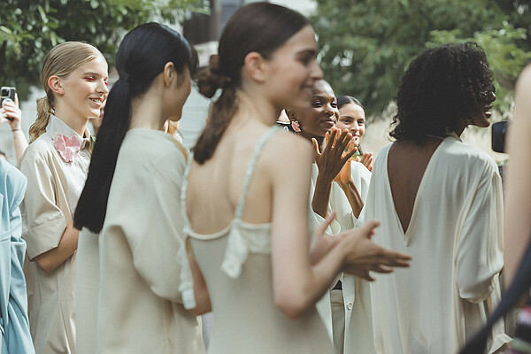 Waiting to taxi – models ready for the runway at Berlin Fashion Week